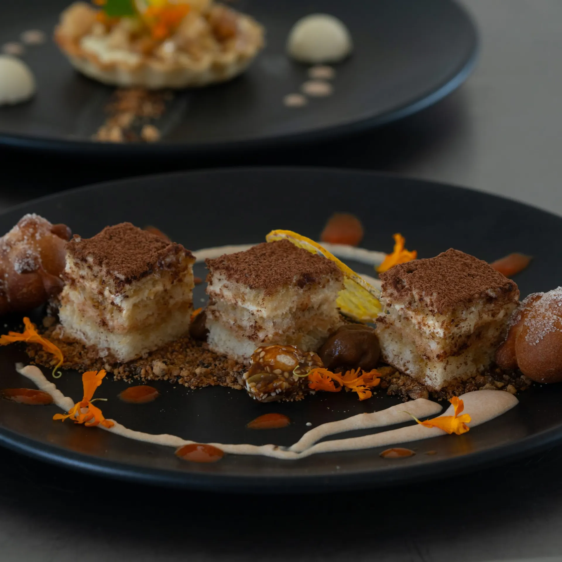 Plated dessert with chocolate and cream