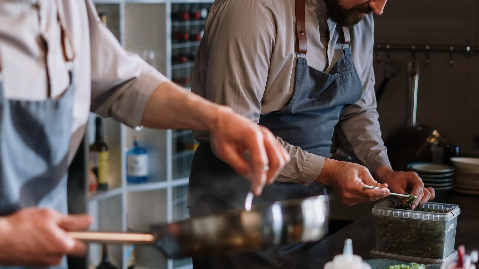 Chefs working the pass during service