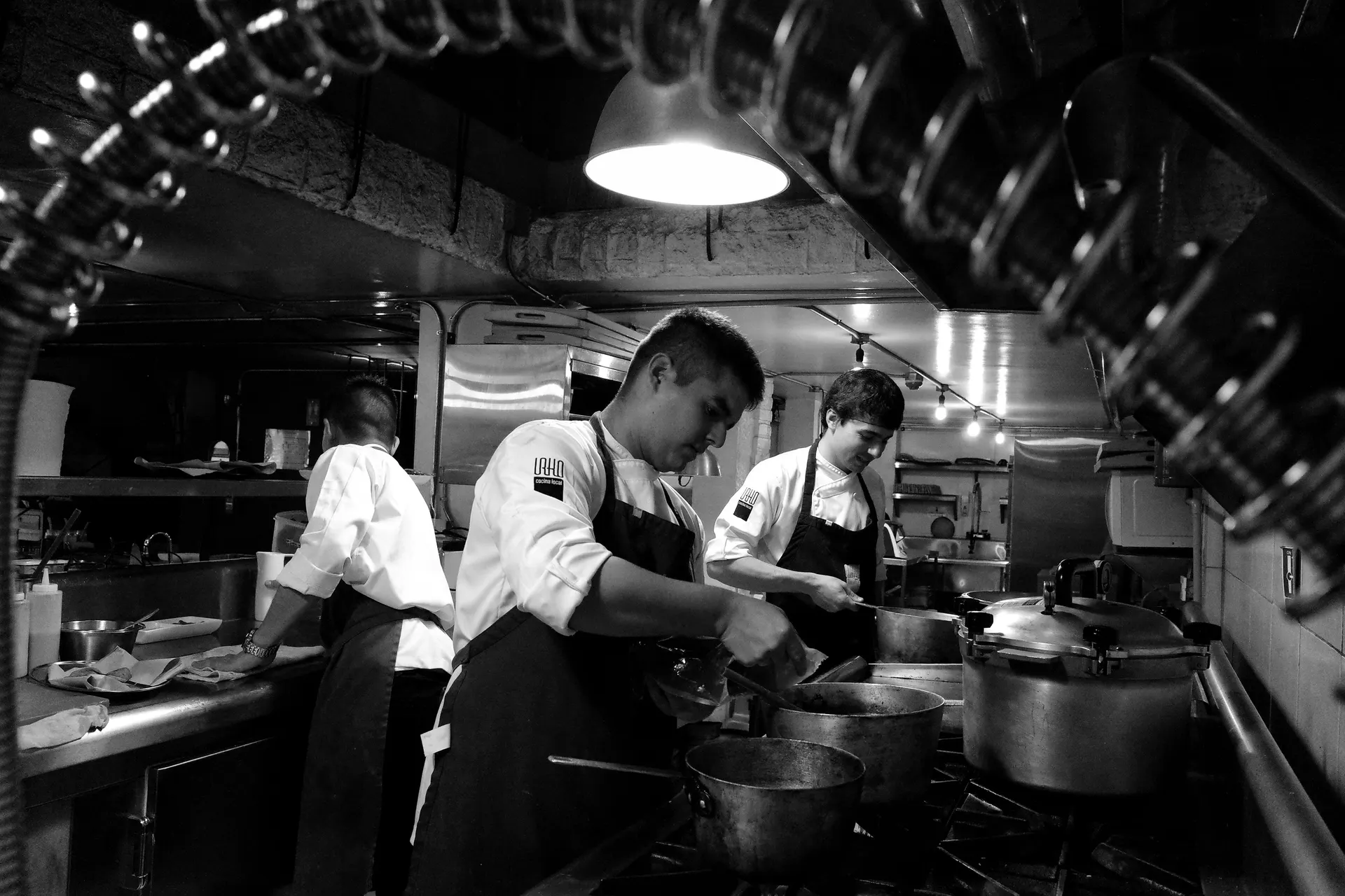 The pastry section at work, in black and white
